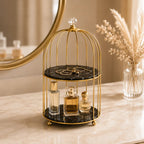 Cage organizer holding perfume bottles on a styled vanity