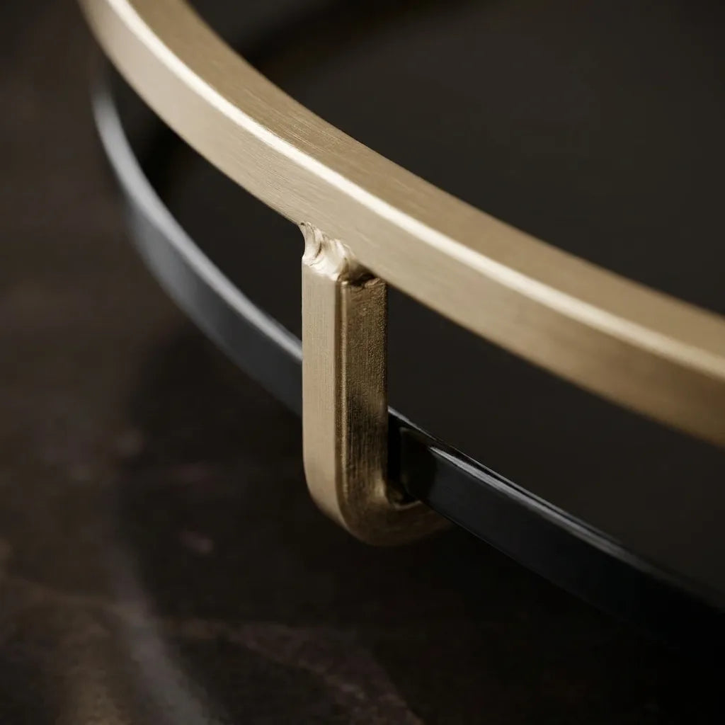 Close-up of the gold frame joint and tray edge