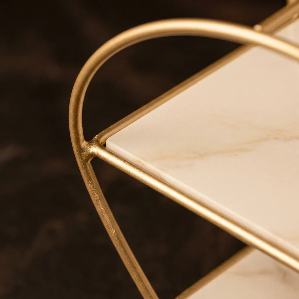 Close-up of the gold wire curve meeting the marble-effect tray