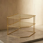 Three-tier corner kitchen rack in Gold, empty on a marble counter
