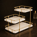 Modern stepped three-tier vanity organizer in Pearl with a gold-finish frame