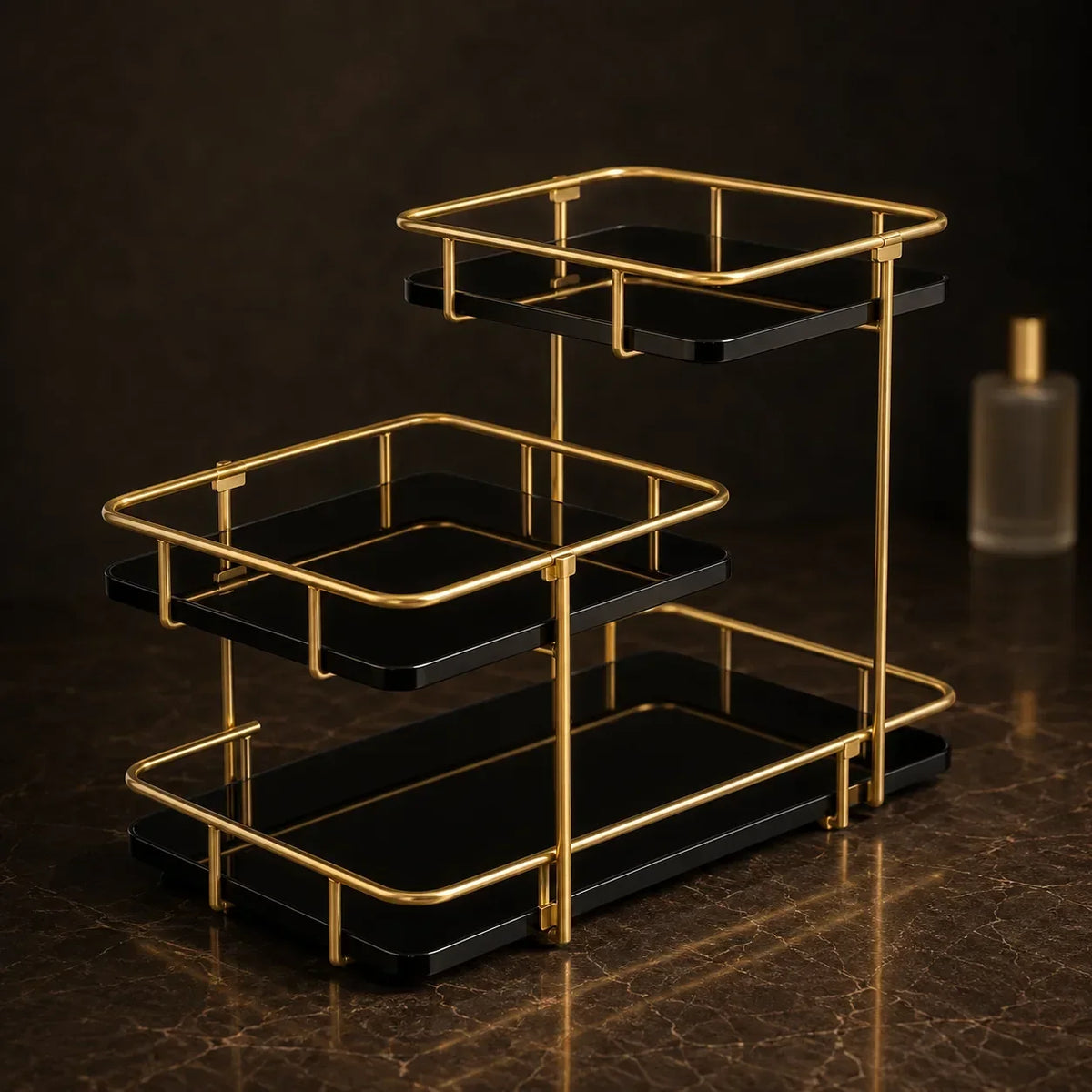 Modern stepped three-tier organizer in Onyx with a gold-finish frame