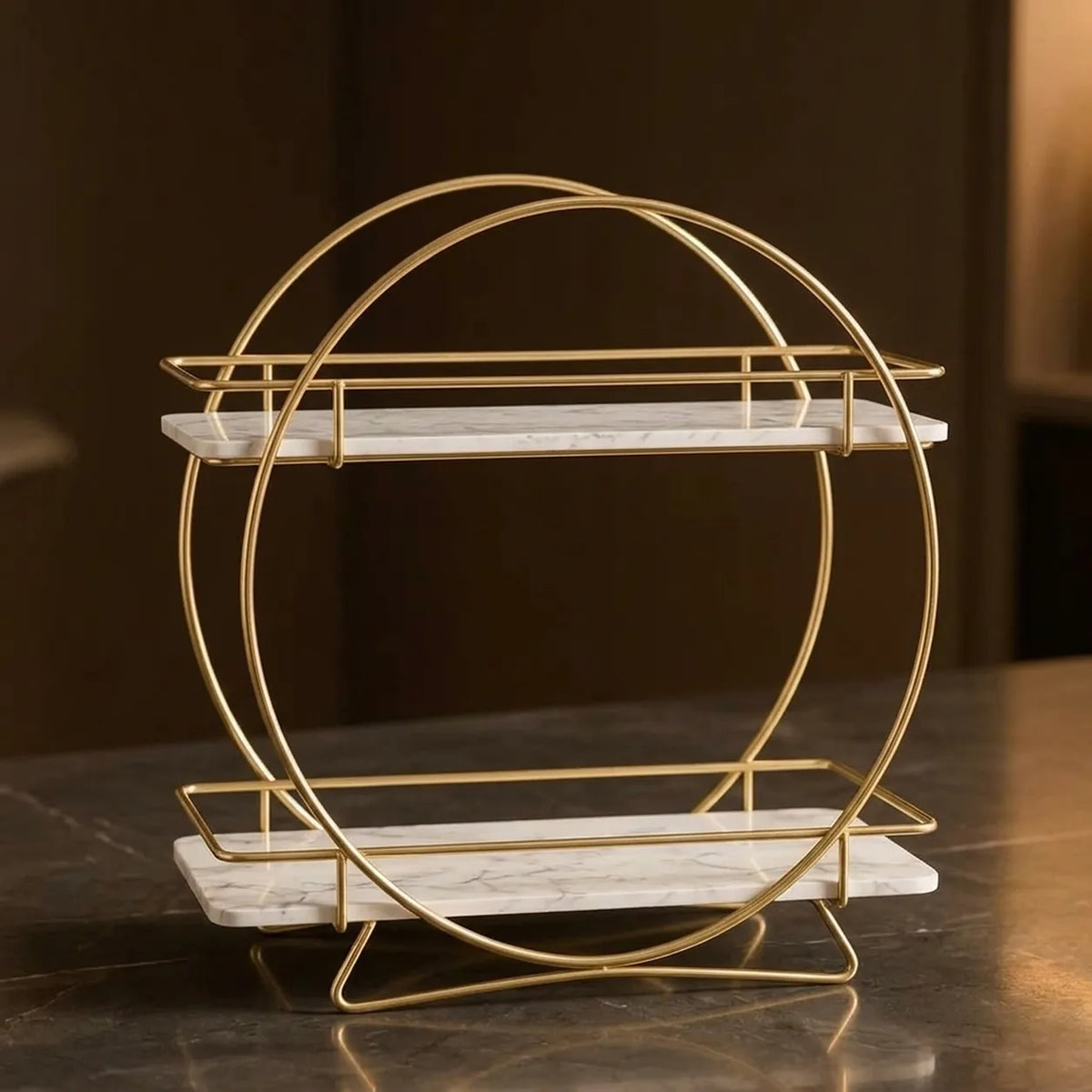 Round two-tier vanity organizer in Pearl — white marble shelves passing through a gold ring frame on splayed gold feet