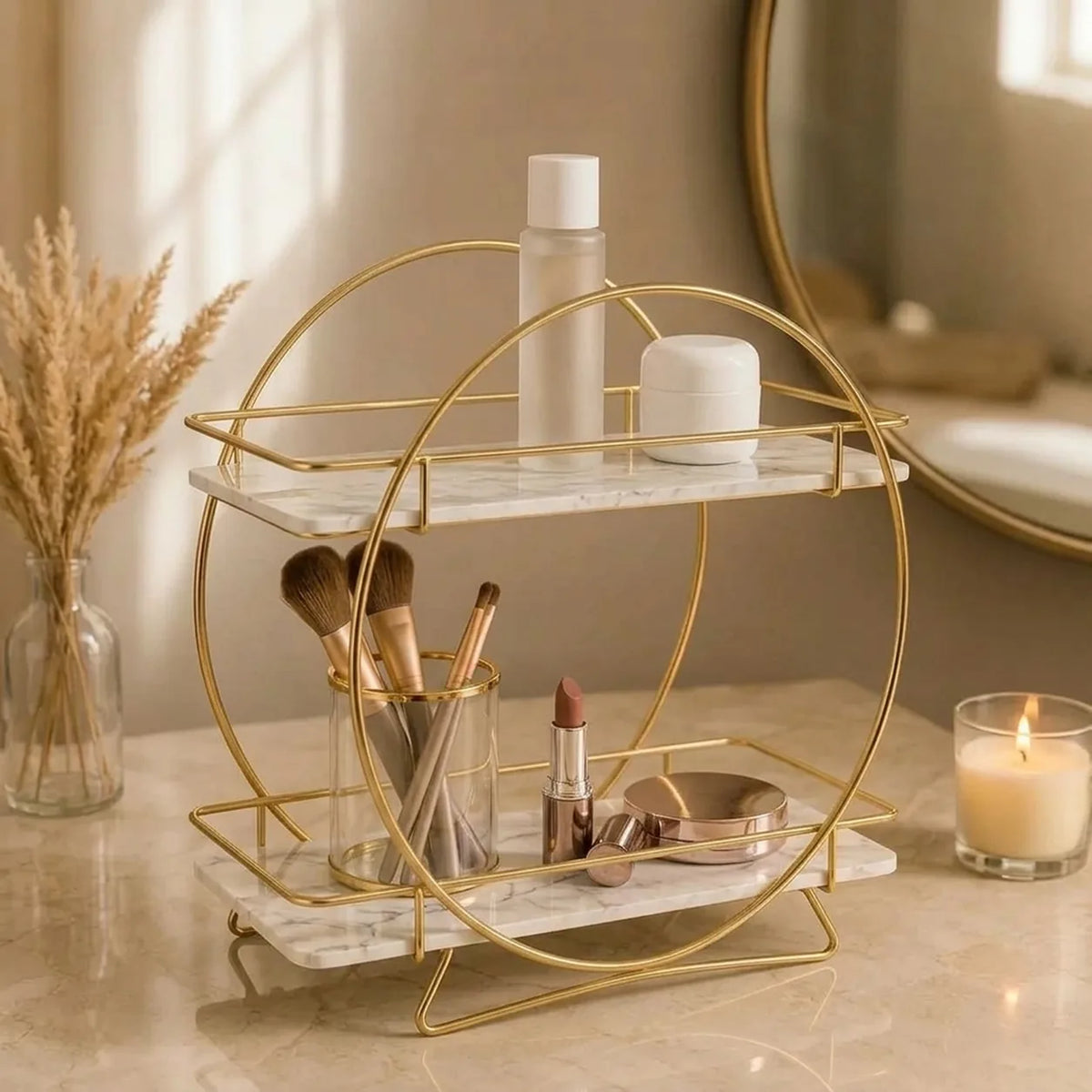 Round two-tier organizer in Pearl holding brushes, lipstick and a compact on a marble counter